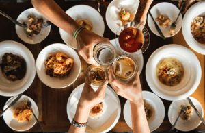 Cheers at restaurant table